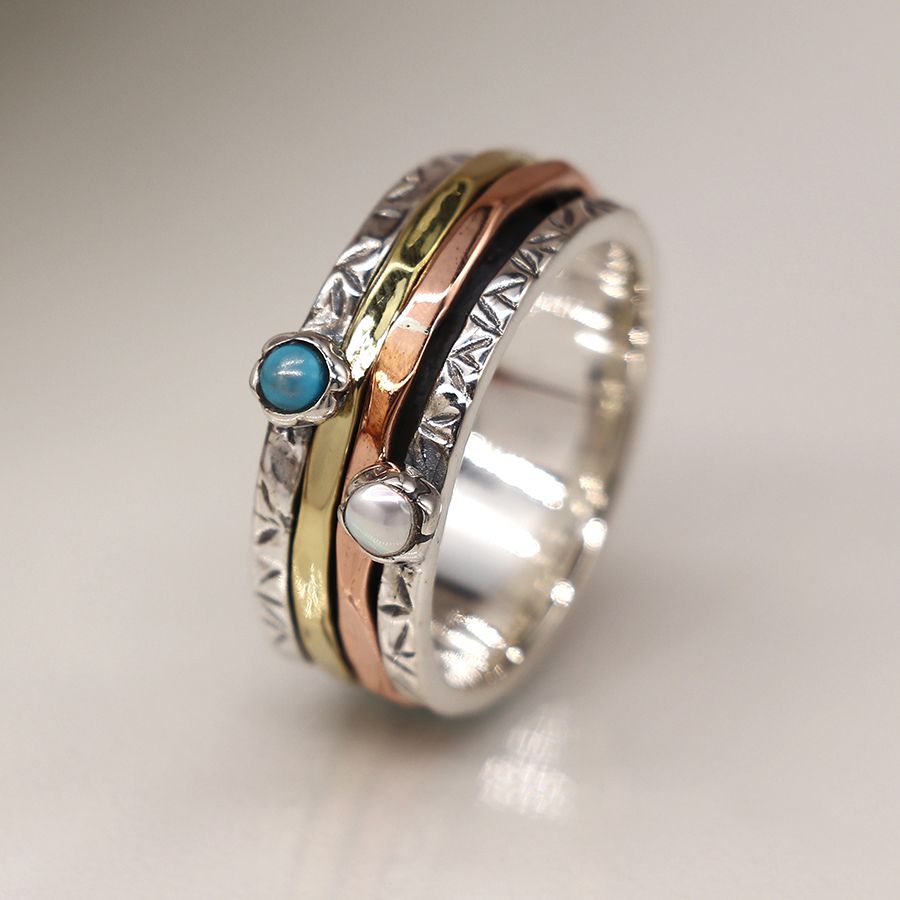 Sterling silver spinning ring with turquoise